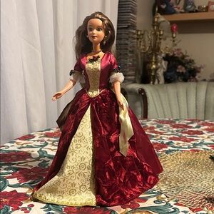 Elegant Doll in Red and Gold Gown